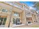 Exterior view of a multi-story building with balconies and patios at 7663 Recife Dr, Kissimmee, FL 34747