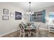 Dining area with a round table and seating for four at 8807 Tatara St, Orlando, FL 32836