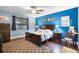 Comfortable bedroom with a large bed, stylish furniture, and modern decor creating a relaxing atmosphere at 8807 Tatara St, Orlando, FL 32836