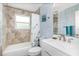 Cozy bathroom featuring a shower-tub combo and single sink at 12100 Calaboose Ct, Orlando, FL 32828