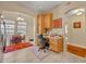 Bright home office space featuring light wood cabinets and a built-in desk at 1211 Stonecutter Dr # 304, Celebration, FL 34747