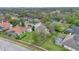 Aerial view highlighting the residential neighborhood with lush greenery and private screened pools at 1601 Billingshurst Ct, Orlando, FL 32825