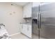 Updated kitchen featuring stainless steel fridge and ample cabinet space at 1913 Woodcrest Dr # B, Winter Park, FL 32792