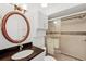 Bathroom features updated shower and vanity with granite counter and vintage-style fixtures at 2106 Northlake Dr # 2106, Sanford, FL 32773