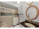 Elegant bathroom featuring a vanity with a granite countertop and glass shower at 2106 Northlake Dr # 2106, Sanford, FL 32773