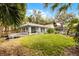 Beautiful building featuring a well maintained lawn, a wood deck, and elegant architecture at 2106 Northlake Dr # 2106, Sanford, FL 32773