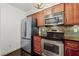 Kitchen featuring stainless steel appliances and sleek cabinetry at 2106 Northlake Dr # 2106, Sanford, FL 32773