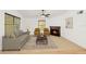 Bright living room featuring a cozy fireplace, neutral furniture, and a ceiling fan at 2106 Northlake Dr # 2106, Sanford, FL 32773