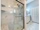 Bathroom with a glass shower and a double sink vanity with granite countertops at 216 Springside Rd, Longwood, FL 32779