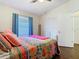 Cozy bedroom with hardwood floors, a ceiling fan and bright decor at 216 Springside Rd, Longwood, FL 32779