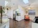 Bright and airy kitchen with skylight, stainless steel appliances, and white cabinetry at 216 Springside Rd, Longwood, FL 32779