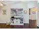 Cozy living room with view into other rooms and custom shelving unit at 216 Springside Rd, Longwood, FL 32779