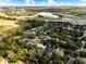 Wide aerial image of a quiet residential neighborhood with mature landscaping and easy highway access at 2856 Park Meadow Dr, Apopka, FL 32703