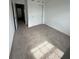 Bedroom featuring neutral carpet, white walls, closet, and natural light at 3587 Davenport Creek Ct, Kissimmee, FL 34746