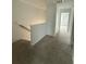 Upstairs hallway featuring carpet and doors to the rooms at 3587 Davenport Creek Ct, Kissimmee, FL 34746