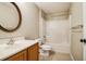 A well-lit bathroom with a sink and a shower-tub combination at 4191 Sw 110Th Ln, Ocala, FL 34476