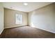 Cozy bedroom featuring neutral walls, carpet, and a bright window view at 4191 Sw 110Th Ln, Ocala, FL 34476