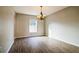 Bright dining room featuring laminate floors, a window view, and neutral walls at 4191 Sw 110Th Ln, Ocala, FL 34476