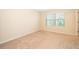 Neutral bedroom with carpet floors and bright windows at 4653 Sparkling Shell Ave, Kissimmee, FL 34746