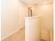 Hallway with carpet flooring and bright white doors at 4653 Sparkling Shell Ave, Kissimmee, FL 34746