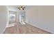 Bedroom featuring carpet flooring, ceiling fan, and sliding glass door access to patio at 472 Huntington Pines Dr, Ocoee, FL 34761