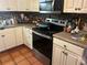 Picture of kitchen with stainless steel appliances, wood cabinets, and tile backsplash at 491 Grandview Ave, Ormond Beach, FL 32176