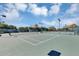 Multiple tennis courts ready for a friendly match on a sunny day with lush landscaping surrounding the area at 515 Mickleton Loop, Ocoee, FL 34761