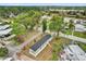 Aerial view of home in community surrounded by mature trees and landscaping at 5227 Orange Ave, Port Orange, FL 32127