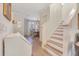 Open hallway with wooden floors and a view into the dining room at 5238 Baskin St, Orlando, FL 32814