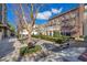 Attractive street view features landscaped gardens, benches, and nearby commercial buildings at 5238 Baskin St, Orlando, FL 32814