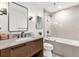 Modern bathroom with a shower/tub combo and sleek fixtures at 724 Lake Davis Dr, Orlando, FL 32806