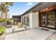 Stylish front entrance with a modern exterior, fire pit, and comfortable outdoor seating at 724 Lake Davis Dr, Orlando, FL 32806