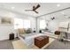 Bedroom featuring a mirrored wall reflecting the bed, white bedding, and neutral decor at 724 Lake Davis Dr, Orlando, FL 32806