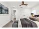 Bedroom featuring a flat screen television, white trim and doors, and modern decor at 724 Lake Davis Dr, Orlando, FL 32806