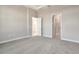 A bedroom that leads to a large, tiled bathroom with glass enclosed shower at 889 Megano Blvd, Deland, FL 32724