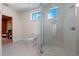 Modern bathroom featuring a glass shower and a sauna at 10912 Mobberley Cir, Orlando, FL 32832