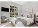 Bedroom with a large window overlooking a beautiful backyard at 10912 Mobberley Cir, Orlando, FL 32832