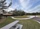 Scenic community park featuring picnic tables and a walking path in a tranquil outdoor setting at 1463 Riverboat Dr, Kissimmee, FL 34744