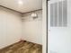 Efficient walk-in closet with shelving, providing ample storage space at 1510 Oak Ln, Casselberry, FL 32707