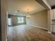 Open floor plan dining room featuring modern chandelier and light tile floors at 15352 Burgtheater Dr, Winter Garden, FL 34787