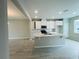 Open kitchen showcasing a center island, white cabinets, and a modern, inviting layout at 15352 Burgtheater Dr, Winter Garden, FL 34787