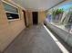 Enclosed back porch with a concrete floor and screened walls, perfect for outdoor relaxation at 1703 Doreen Ave, Ocoee, FL 34761