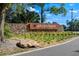 Stone sign at the entrance of Arden Park, complemented by lush landscaping at 1711 Lake Sims Pkwy, Ocoee, FL 34761