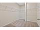 Walk-in closet with carpet flooring and wire shelving at 1711 Lake Sims Pkwy, Ocoee, FL 34761