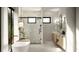 Bright bathroom with a soaking tub, walk-in shower, double vanity, light wood cabinets, and black accents at 2102 S Osceola Ave, Orlando, FL 32806