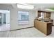 Eat in kitchen with view into the sun room and stainless steel appliances at 215 Nob Hill Cir, Longwood, FL 32779