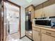 Laundry room with white washer machine at 215 Nob Hill Cir, Longwood, FL 32779