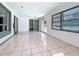 Large sun room with tile flooring and lots of natural light at 215 Nob Hill Cir, Longwood, FL 32779
