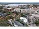 Aerial view of the property with water in the distance, featuring a serene and desirable location at 229 Alexander Pl, Winter Park, FL 32789