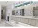 Bright bathroom with double vanity, granite countertops, and modern fixtures at 229 Alexander Pl, Winter Park, FL 32789